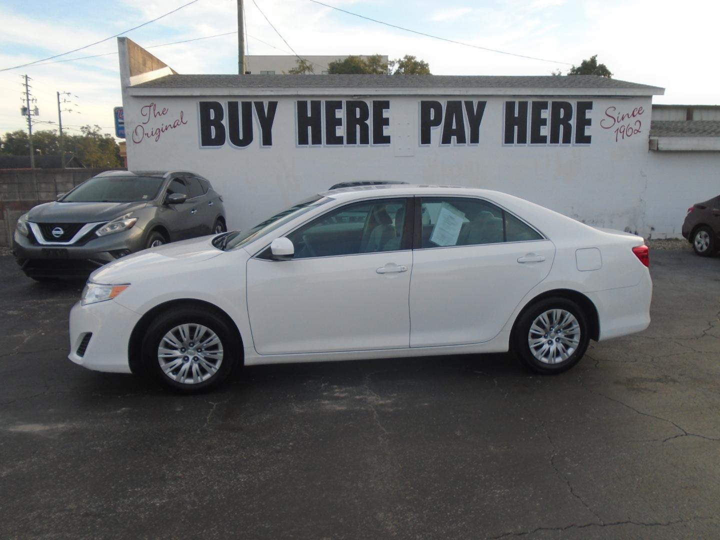 2014 Toyota Camry (4T1BF1FK0EU) , located at 6112 N Florida Avenue, Tampa, FL, 33604, (888) 521-5131, 27.954929, -82.459534 - Photo#0